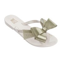 Mel Harmonic Bow Flip Flop, Beige Gold Glitter
